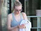 Make up free Dakota Fanning works up a sweat while getting in a morning at the...