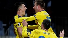 Fotbalisté BATE Borisov se radují ze senzaního vedení nad Arsenal v utkání...