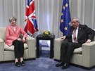 Britská premiérka Theresa Mayová a pedseda Evropské komise Jean-Claude Juncker...
