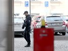 Policist� zasahuj� na brn�nsk�m ��adu pro ochranu hospod��sk� sout�e (�OHS)....