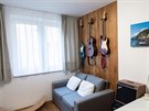 Dřevěná stěna vytvořená z podlahových prken je určena pro důstojné umístění...