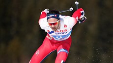 Norský lya Hans Christer Holund získal v závod na 50 km voln zlatou medaili.
