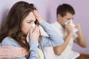 26537182 - sick woman and man have cold, flu and high fever