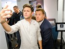 Niall Horan does a selfie with James Corden during
