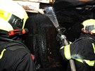 V pražských Kobylisích zasahovali hasiči u požáru stavební buňky. Uvnitř...