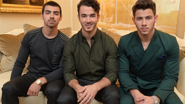 NEW YORK, NY - SEPTEMBER 05: (L-R) Joe Jonas, Kevin Jonas, and Nick Jonas of the Jonas Brothers attend the Mercedes-Benz Star Lounge during Mercedes-Benz Fashion Week Spring 2014 at Lincoln Center on September 5, 2013 in New York City.  (Photo by Mike Coppola/Getty Images for Mercedes-Benz)