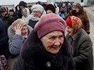Lidé na kontrolním stanoviti v obci Majorsk. (25. února 2019)