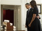 Americký prezident Barrack Obama a jeho manelka Michelle si pipomínají obti...