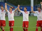 Zlíntí fotbalisté slaví výhru nad Slavií.