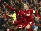 Divock Origi (Liverpool) se raduje ze své premiérové trefy v Lize mistr,...