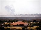 Výbuch na palestinské stran hranice Pásma Gazy s Izraelem (snímek z pohledu...