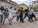 Huawei workers play a 'team building' game at the end of the lunch break at the...