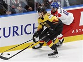 Czech forward Jan Kovář is catching up with German Moritz Seider.