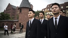  Huawei security guards line-up at the end of their workday at the new...