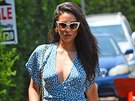 Actress Shay Mitchell looked stunning in a blue minidress as she arrived at a...