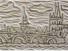 Detail vyrytého lina s motivem Karlova mostu.