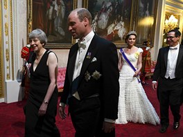 Britská premiérka Theresa Mayová, princ William, vévodkyn Kate a americký...