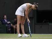 Karolna Plkov ve tetm kole Wimbledonu, ve kterm se utkala s Tchjwankou...