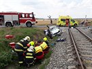 P�i sr�ce vlaku s osobn�m autem u N��an na Plze�sku se v�n� zranili dva mu�i....