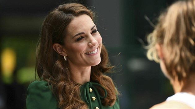 Britain's Kate, the Duchess of Cambridge meets junior players ahead of the Women's Final match on day twelve of the Wimbledon Tennis Championships in London, Saturday, July 13, 2019. (Victoria Jones/Pool Photo via AP)
