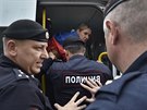 Rutí policisté zatýkají na moskevské demonstraci za svobodné volby opoziní...