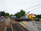Kamion po sráce s vlakem na pejezdu v praské Uhínvsi (6. záí 2019)