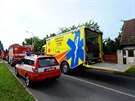 Záchranái u sráky vlaku a kamionu na pejezdu v Uhínvsi (6. záí 2019)