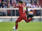Philippe Coutinho z Bayernu Mnichov proměňuje penaltu v utkání proti Kolínu nad...