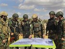 Tureckem podporovaní bojovníci Svobodné syrské armády se připravují na tureckou...