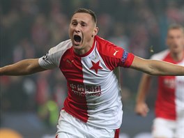 Slávista Jan Bo�il  slaví gól do sít� Barcelony v utkání Ligy mistr�.