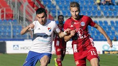 Rudolf Reiter z Ostravy (vlevo) a Ond�ej Zmrzlý z Olomouce se p�etla�ují o...