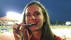 Se zaslou�enou medailí loni v Berlín�