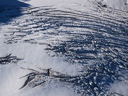 Praskliny na výcarském ledovci Trient.