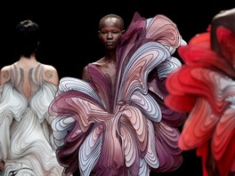 Models present creations by Dutch designer Iris van Herpen as part of her Haute...