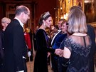 Vévodkyn Kate se zdraví s hosty na recepci v Buckinghamském paláci (Londýn,...