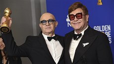 Bernie Taupin a Elton John s cenou za nejlepí filmovou skladbu.