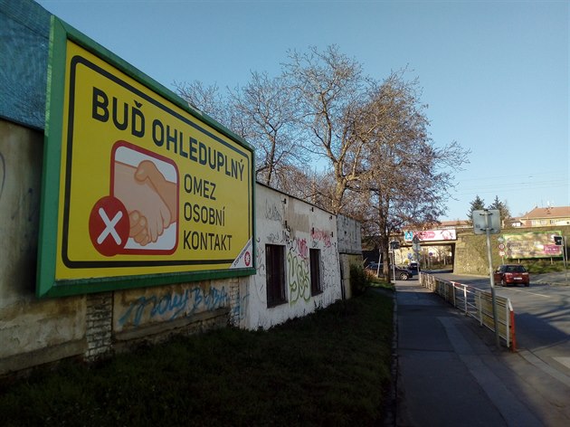 Bilbord proti íení Covidu