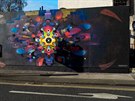 Pouliní graffiti zobrazující koronavirus v irském Dublinu. (28. bezna 2020)