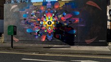 Pouliní graffiti zobrazující koronavirus v irském Dublinu. (28. bezna 2020)