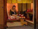 Japonská prostitutka ve výloze podniku v ósacké tvrti ervených luceren...