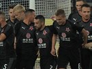Nico Stanciu (uprosted . 7) a jeho parta. Slávisté se radují z gólu v utkání...