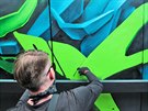Karlovarsk streetartov umlec Real143 pi malb graffiti na stny u ramp do...