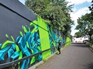 Karlovarsk streetartov umlec Real143 pi malb graffiti na stny u ramp do...