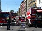 Por dvou byt ve Strojnick ulici v Praze 7. Hasii dm evakuovali. (1.7.2020)