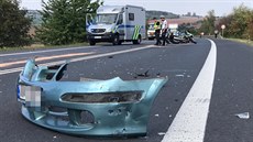 Nehoda policejní motorky s autem nedaleko msta Slaný.
