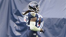 Derrick Henry z Tennessee Titans skóruje proti Houston Texans, Justin Reid ho...