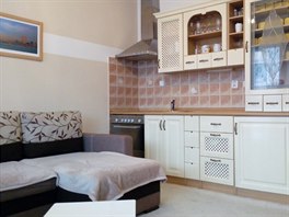 Obývací pokoj s kuchyňským koutem - současný stav