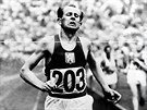 Slavn Ztopkova fotka z olympidy v Helsinkch z roku 1952, kde zskal ti...