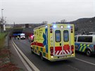 Nehoda policejn�ho vozu p�i v�jezdu z tunelu Blanka ve sm�ru na Troju a...