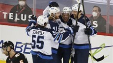 Wheeler (26), Mark Scheifele (55), Kyle Connor (81) and Paul Stastny (25) slaví...